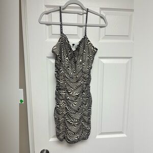 2 for 1 bodycon ruffle dress. Brown and black and white print.